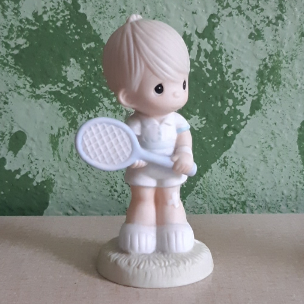 Precious Moments boy Serving the Lord Figurine